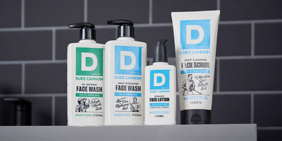 Duke Cannon New Face Care line on a bathroom counter top.