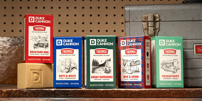 All 5 Thermos collaboration scents on a work bench,