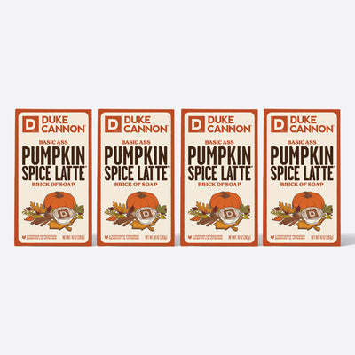 Four Duke Cannon Pumpkin Spice Latte soap packages on a white background