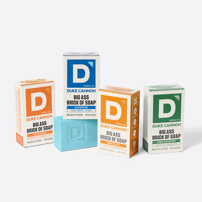 Four blue Big Ass Bricks of Soap. Our Wayfinder, Superior, Sawtooth and High Country Scents.