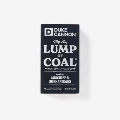 Big Ass Brick of soap inside of its packaging with 'Duke Cannon' branding on a white background. Big Ass Lump of Coal.