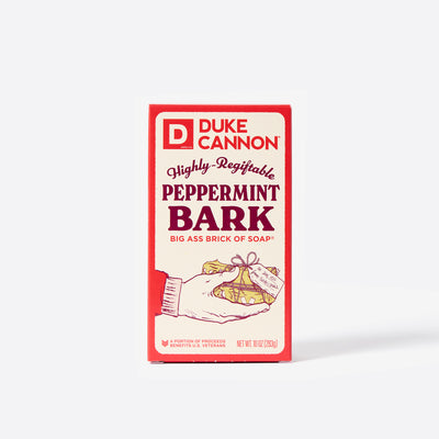 Big Ass Brick of soap inside of its packaging with 'Duke Cannon' branding on a white background. Highly Regiftable Peppermint Bark Ass Big Brick of Soap.