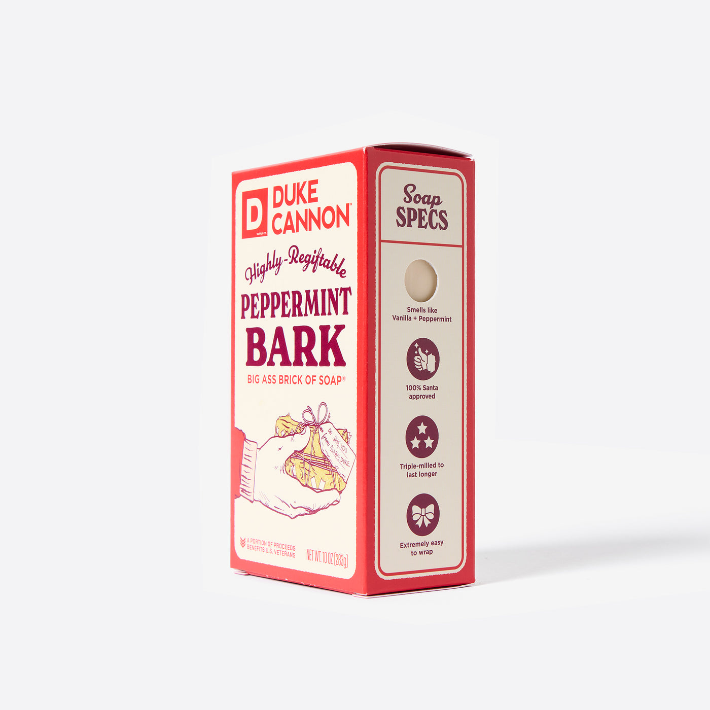 Big Ass Brick of soap inside of its packaging with 'Duke Cannon' branding on a white background. Highly-Regiftable Peppermint Bark. With the soap specs on the side.