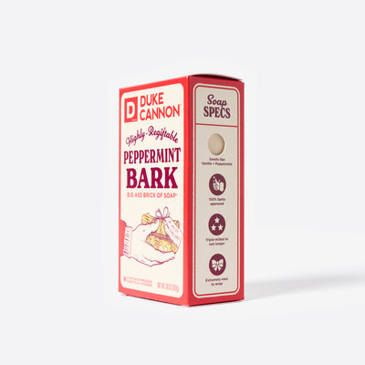 Big Ass Brick of soap inside of its packaging with 'Duke Cannon' branding on a white background. Highly-Regiftable Peppermint Bark. With the soap specs on the side.