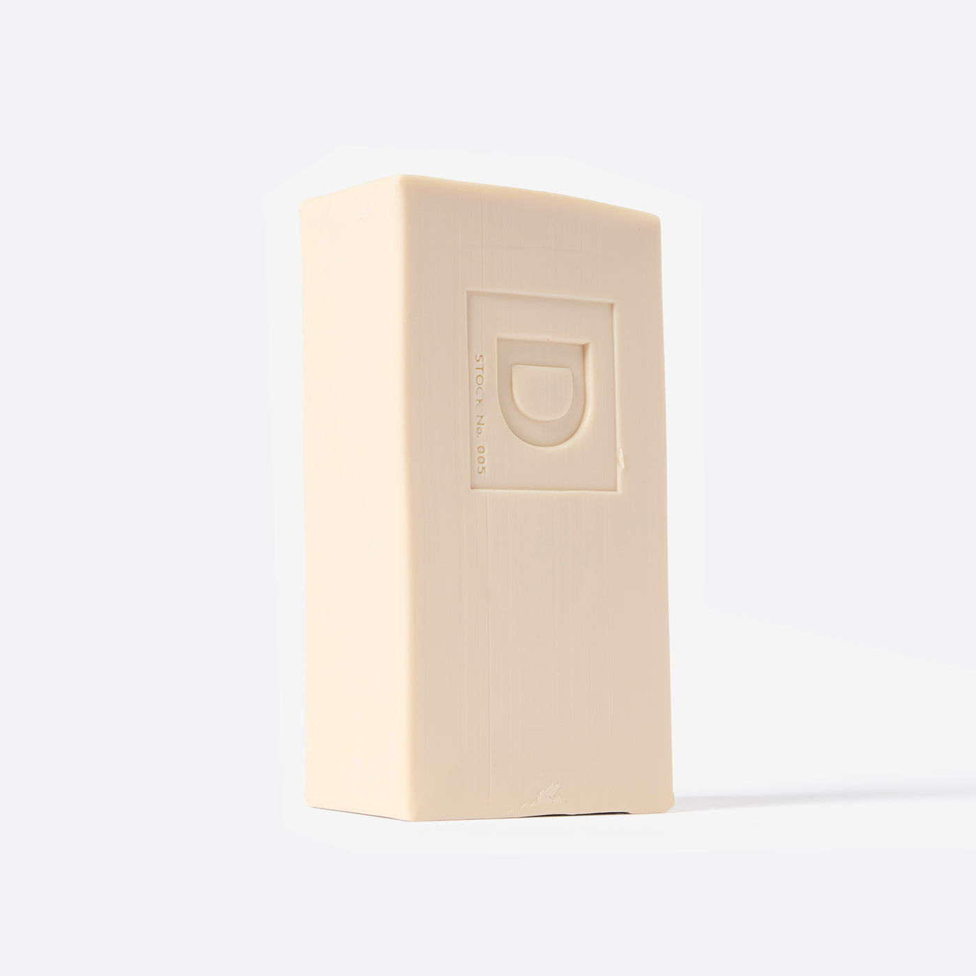 Bar of soap with a Duke Cannon brand logo on a white background. Highly Regiftable Peppermint Bark.
