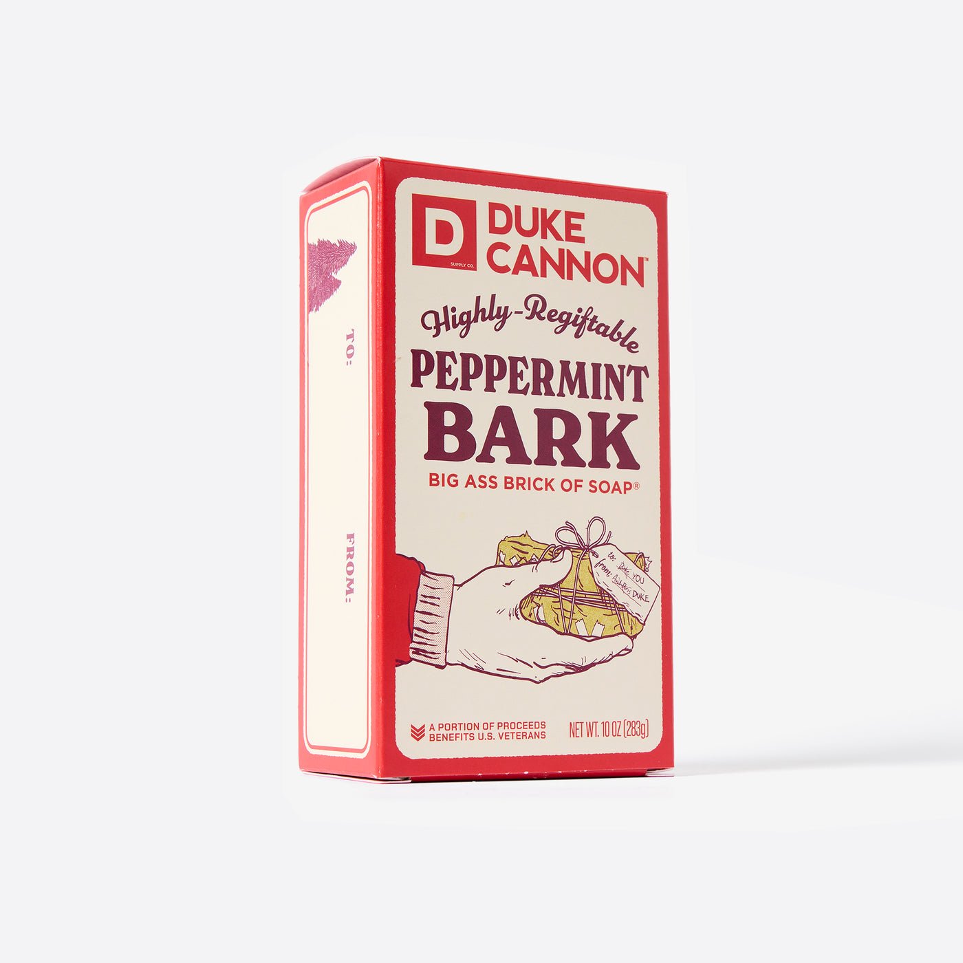Big Ass Brick of soap inside of its packaging with 'Duke Cannon' branding on a white background. Highly-Regiftable Peppermint Bark. an open TO and FROM area to fill in yourself.