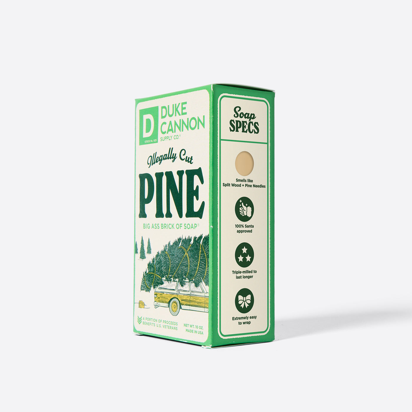 Big Ass Brick of soap inside of its packaging with 'Duke Cannon' branding on a white background. Illegally Cut Pine. With the soap specs on the side.