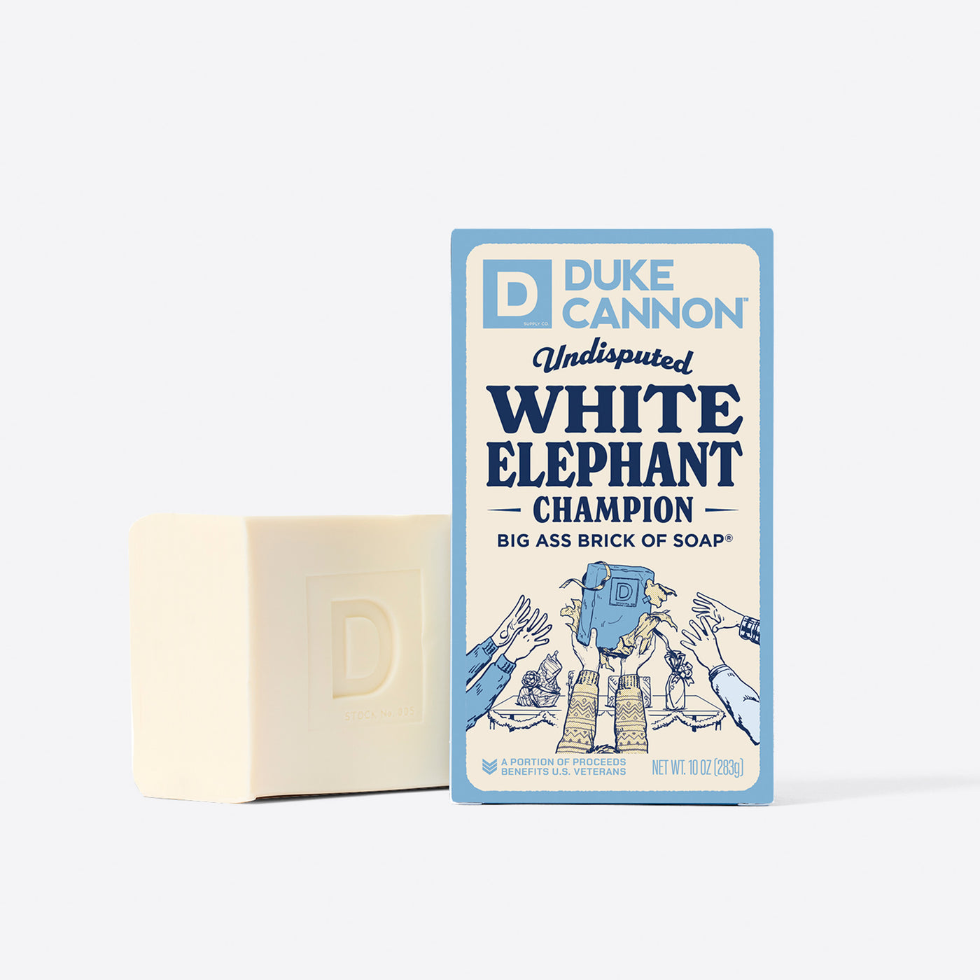 Big Ass Brick of soap next to its packaging with 'Duke Cannon' branding on a white background. Undisputed White Elephant Champion.