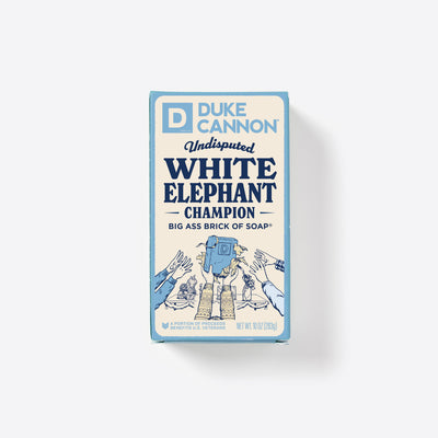 Big Ass Brick of soap inside of its packaging with 'Duke Cannon' branding on a white background. Undisputed White Elephant Champion.
