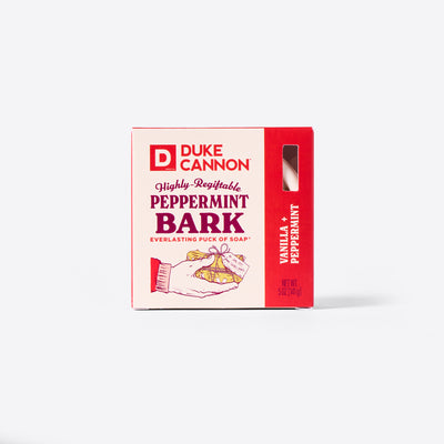 Duke Cannon Highly Regiftable Peppermint Bark Everlasting Puck of Soap packaging with the Soap Puck on the inside. On a white background. Scent is Vanilla + Peppermint. 