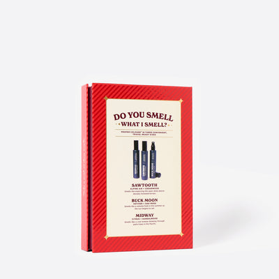 The back of the Red Holiday Book cologne gift set called Merry Little Sniffmas Vol. 1. It includes a Buck Moon, Midway and Sawtooth cologne ration. The back reads, "Do you smell what I smell?"