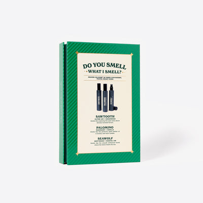The back of the Green Holiday Book cologne gift set called Merry Little Sniffmas Vol. 2. It includes a Palomino, Seawolf and Sawtooth cologne ration. The back reads, "Do you smell what I smell?"
