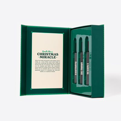 The inside of the Green Holiday Book cologne gift set called Merry Little Sniffmas Vol. 2. It includes a Palomino, Seawolf and Sawtooth cologne ration.