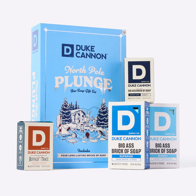 Duke Cannon North Pole Plunge Bar Soap Gift Set with a Midway Bar Soap, a  Midnight Swim Bar, a Superior Bar and a Buffalo Trace Bourbon bar on a white background.