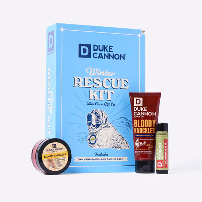 Duke Cannon Winter Rescue Kit Skin Care Gift Set set with Bloody Knuckles Hand Repair Balm, balm and Lip Balm on a white background