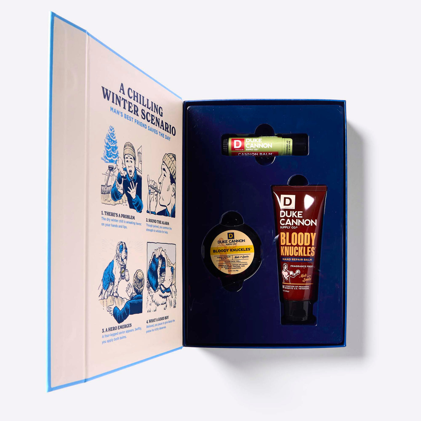 Inside of the Duke Cannon Winter Rescue Kit Skin Care Gift Set set with Bloody Knuckles Hand Repair Balm, balm and Lip Balm on a white background