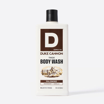 Bottle of Duke Cannon Thick Body Wash in the Palomino Scent on a white background. Palomino - Mahogany + Vanilla scent.