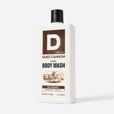 Bottle of Duke Cannon Thick Body Wash in the Palomino Scent on a white background. Palomino - Mahogany + Vanilla scent.